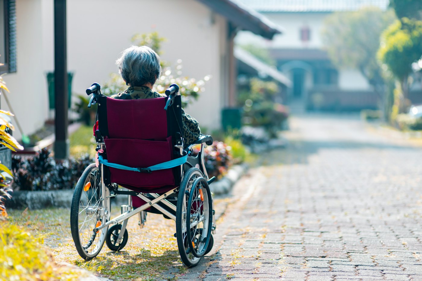 Woman using a wheelchair outdoors